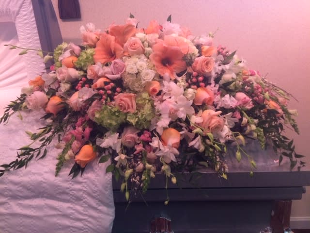 Gentle custom blended design with specialty blooms.  Colors may vary.

Some flowers