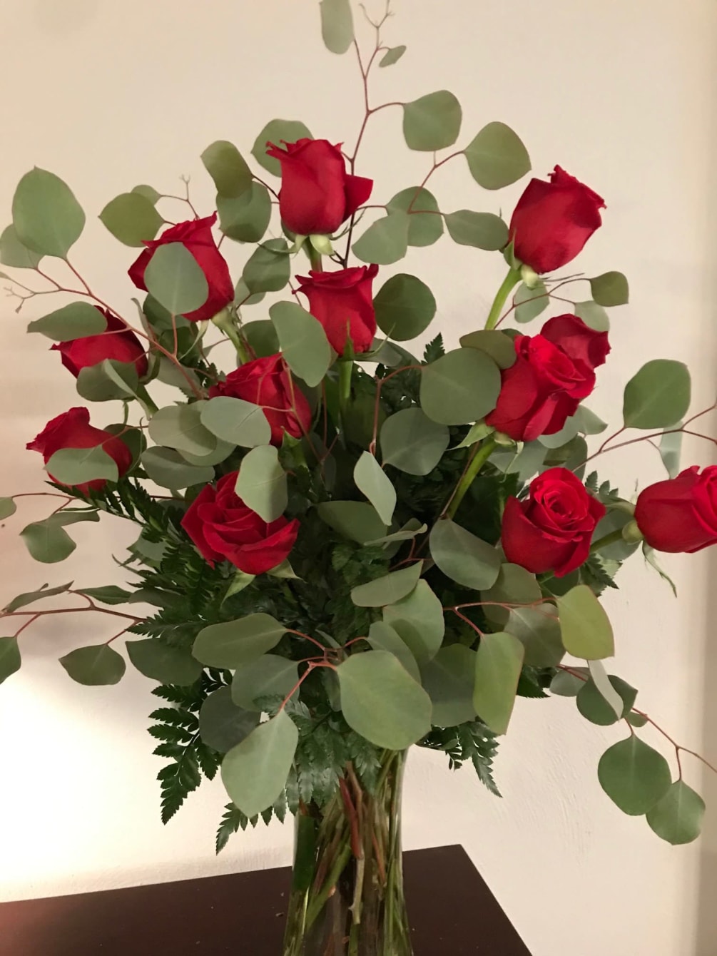 Red Roses With Silver Dollar Eucalyptus By Julian S Flowers
