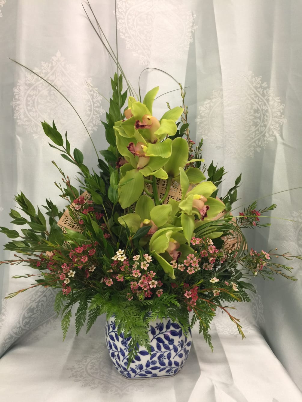 Cymbidium Fan Floral arrangement by Flower Fair