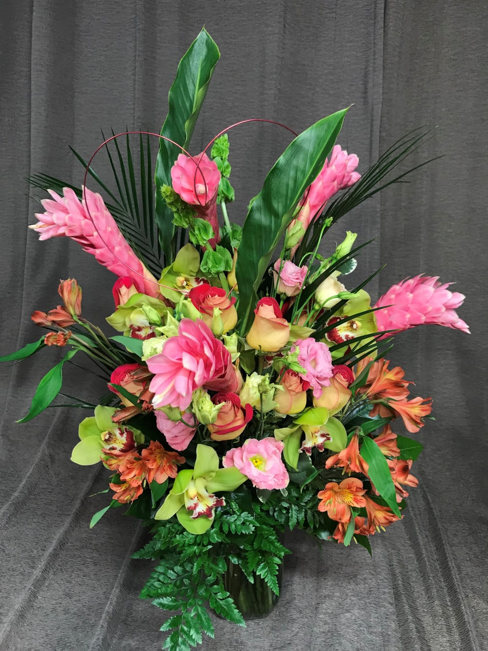 Tropical tall ginger and green accent flowers, seasonal flowers and beautiful Cymbidium
