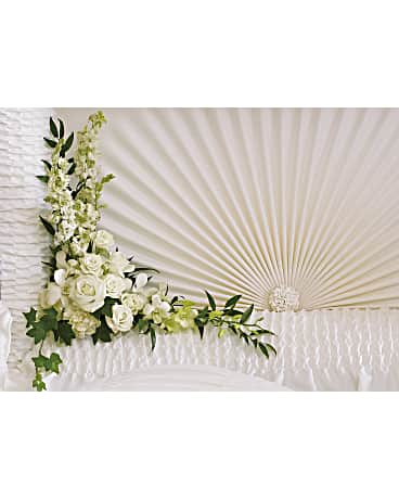 Designed for inside the casket, this gorgeous array of white orchids, white