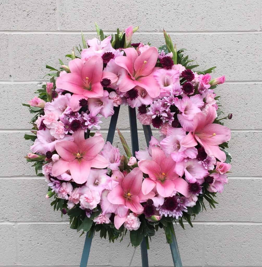 Standing wreath including: rose, lily, gladiolus...