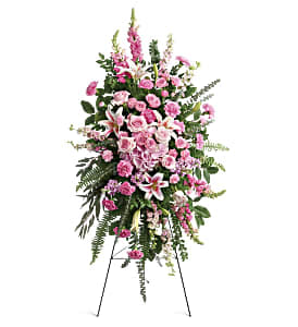 This glorious spray of  hydrangea, roses and lilies is an especially