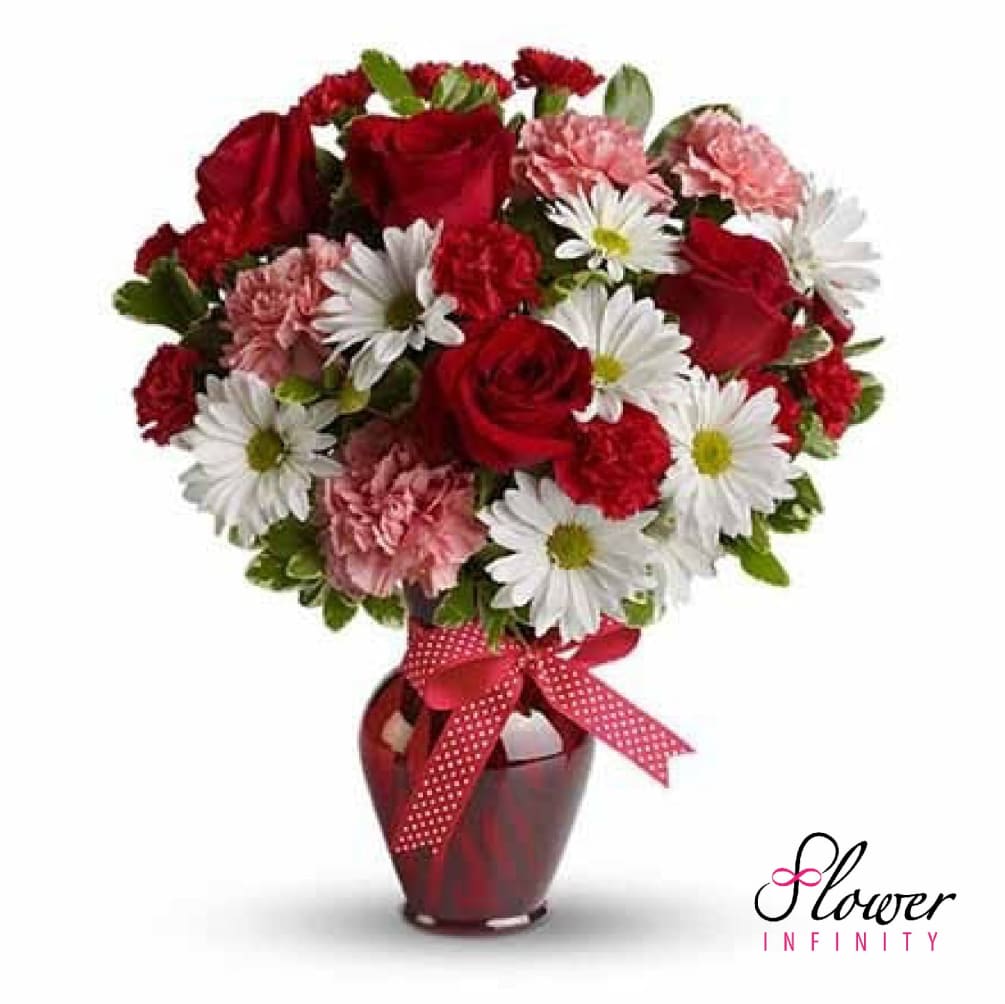 A cute mix of carnations, daisies, and red roses. Perfect for Valentine&#039;s