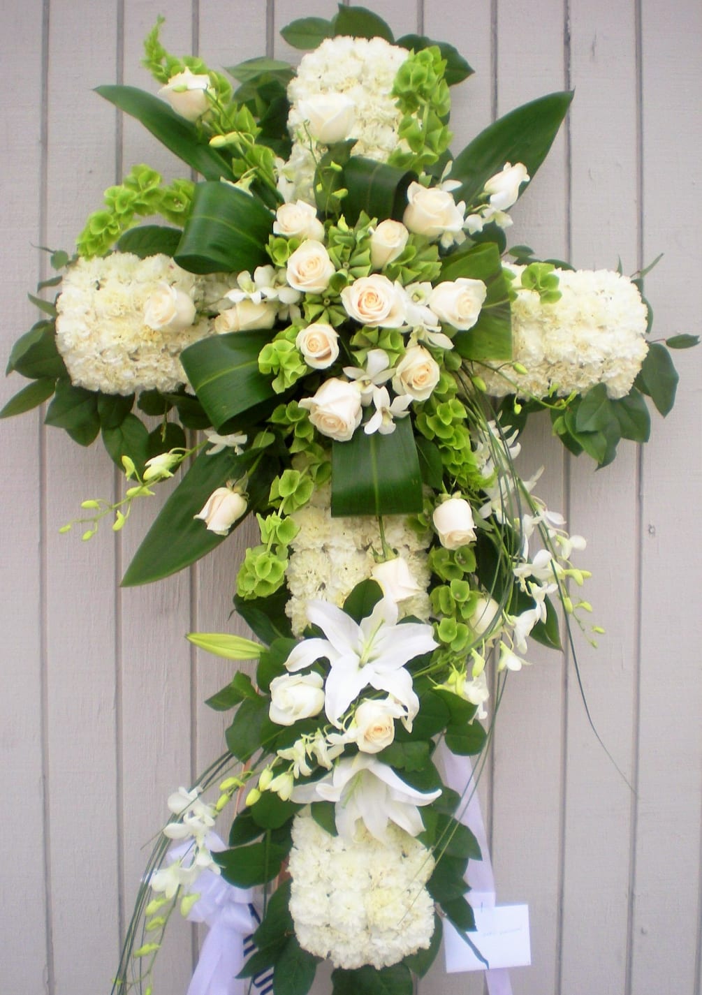 Cross flowers for funeral discount