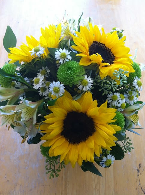 Everyone needs a smile and a warm hug. Sunflower Sunshine is the
