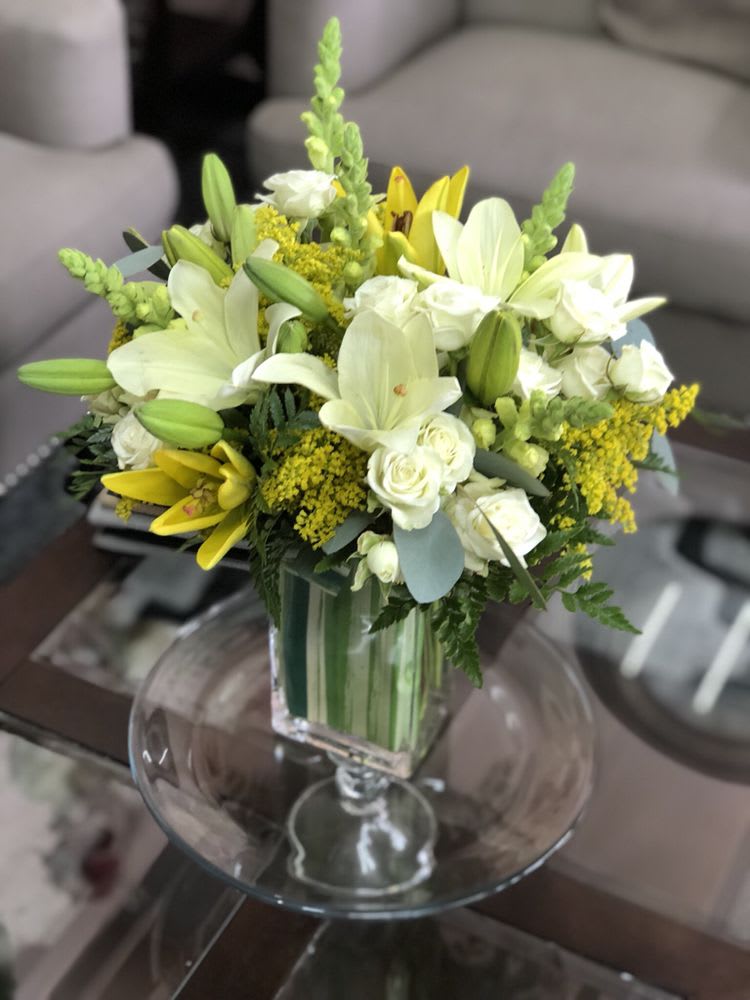 White Lily, White Roses, Yellow Lily, Bells of Ireland in a square