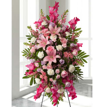 Lavender and pink Roses surrounded by Gladiolus and snap dragons, white carnations