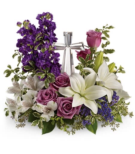 A bouquet to remember. This glorious garden of roses, lilies and alstroemeria