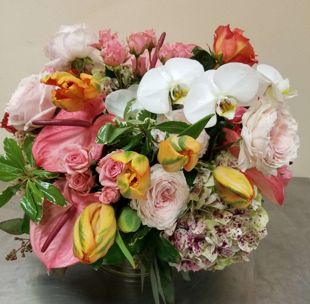 A gorgeous selection of premium garden blooms including roses and antique hydrangea