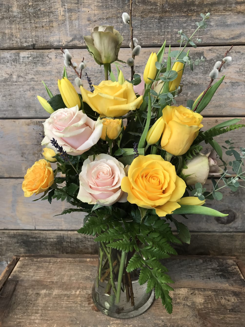 Our artisan handmade arrangement&#039;s overall theme is shades of yellow. The actual