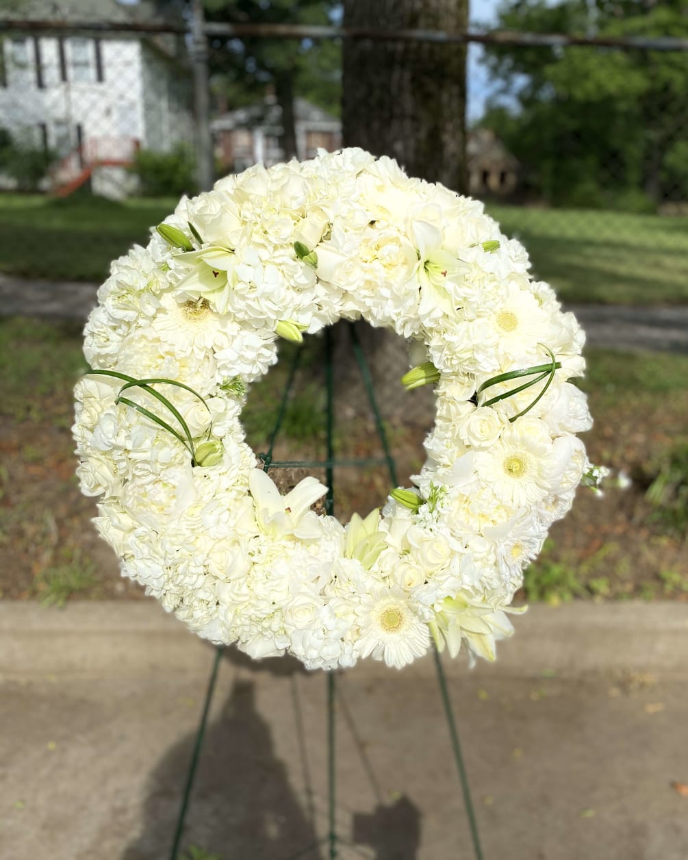 All White Funeral Wreath by Anointed Flowers & Gifts