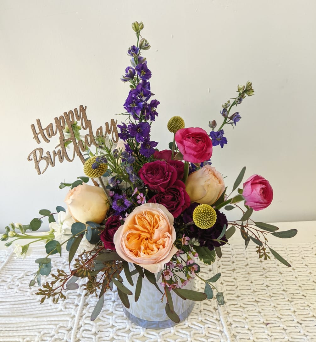 The perfect birthday gift with an assortment of flowers with a gold