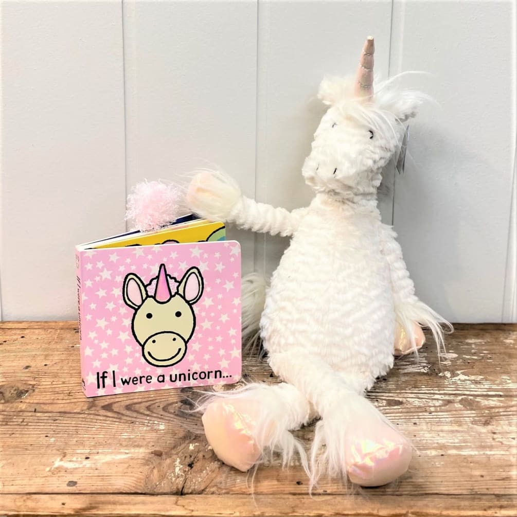 This gift set includes a Jellycat Unicorn friend and a matching book