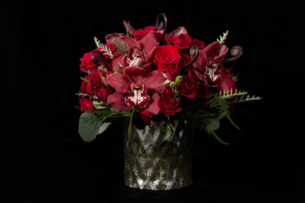Elegant silver mercury glass vase featuring red mini spray roses, premium red