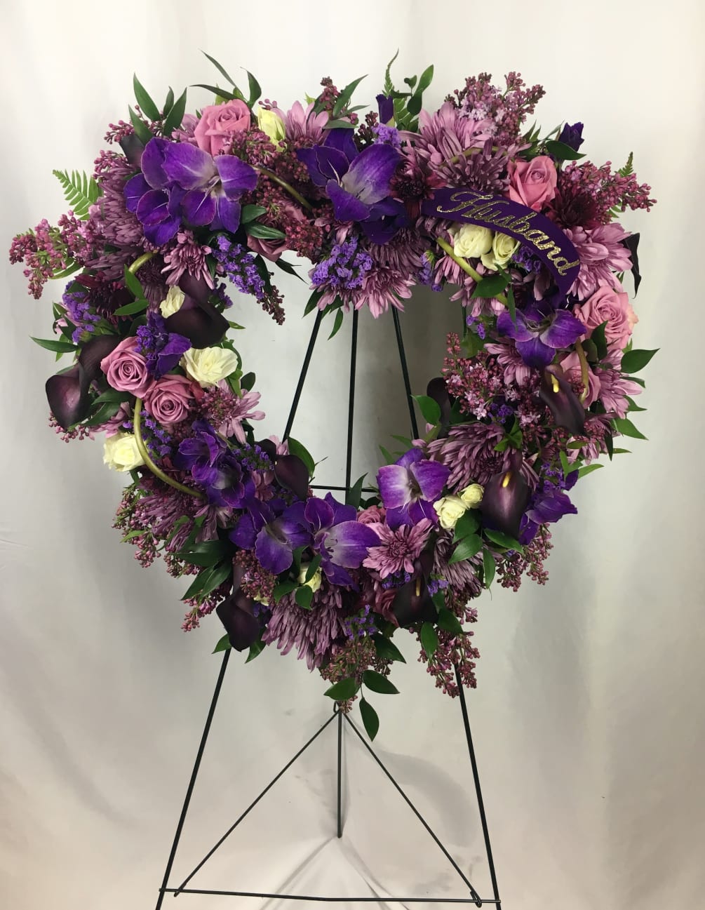 Heart Shaped piece in shades of Purples.  
Flowers can be in