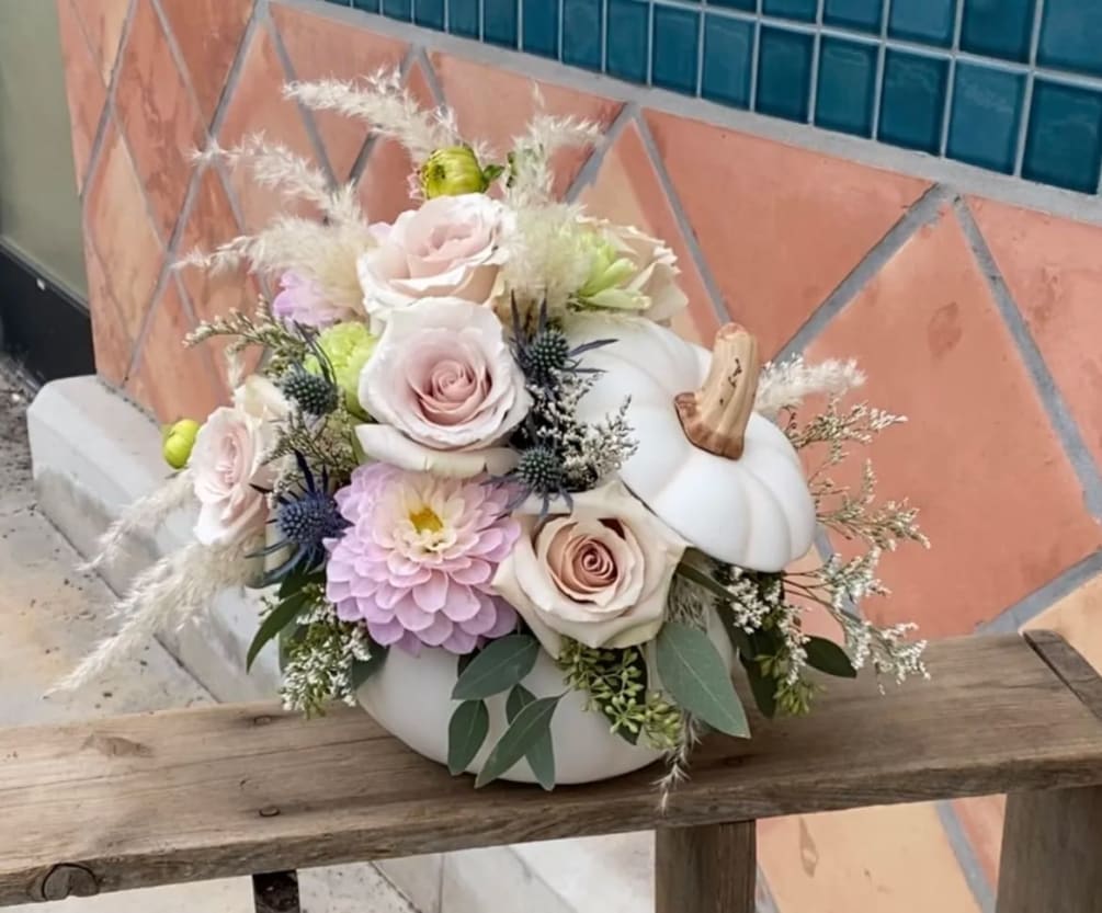 Give something magical like this white and pink flower arrangement in an