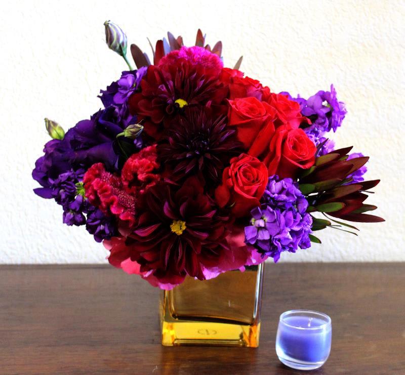 Daliahs, stunning red roses, a touch of lavender and purples to set