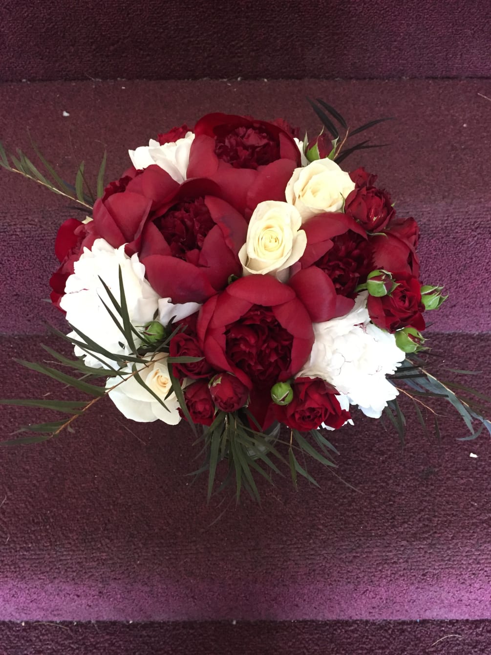 bridal bouquet with peony, rose, lisianthus and accents.