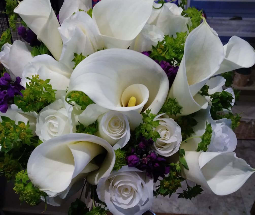 bridal bouquet with white lilies and roses