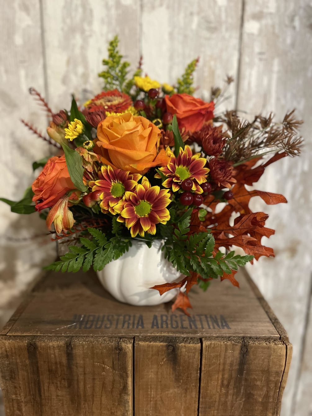 This adorable pumpkin arrangement will be a hit for any fall holiday!