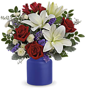 Revel in the crisp, classic color scheme of pristine white lilies and