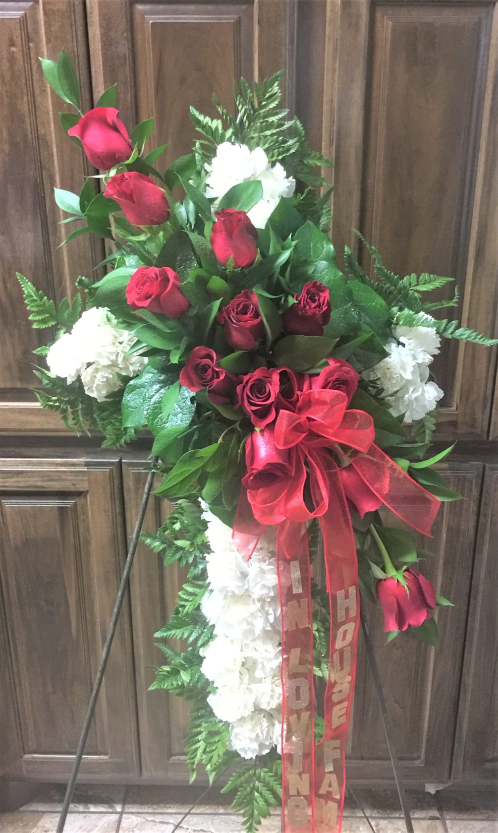 white carnations cross with red roses