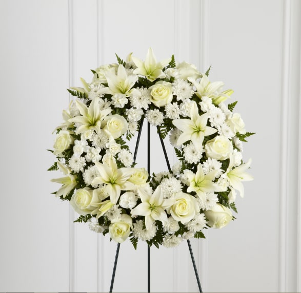 The FTD Treasured Tribute Wreath offers peaceful wishes of heartfelt sympathy with