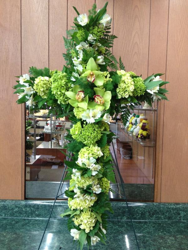 Sympathy Large Cross with green hydrangea, orchids and other mix flowers