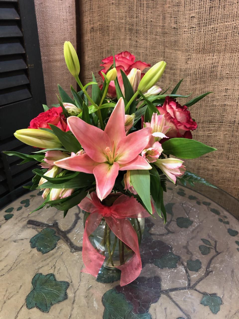 Roses, Lilies &amp; Alstromeria in a vase
- Remember our lilies arrive in