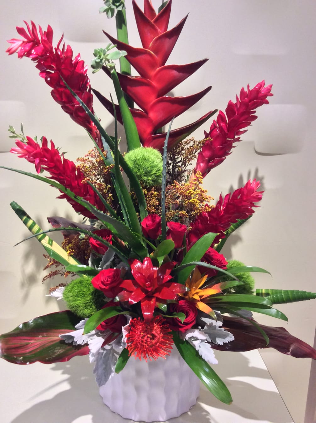 This collection of flowers from around the world , bromeliad ,orchids, ginger