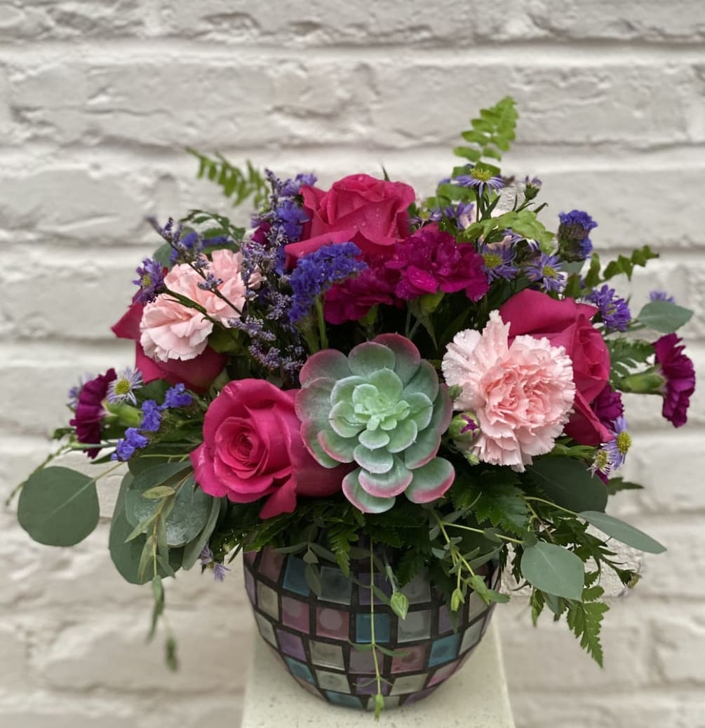 These flowers lend an organic feel to this extraordinary jewel-toned bouquet of