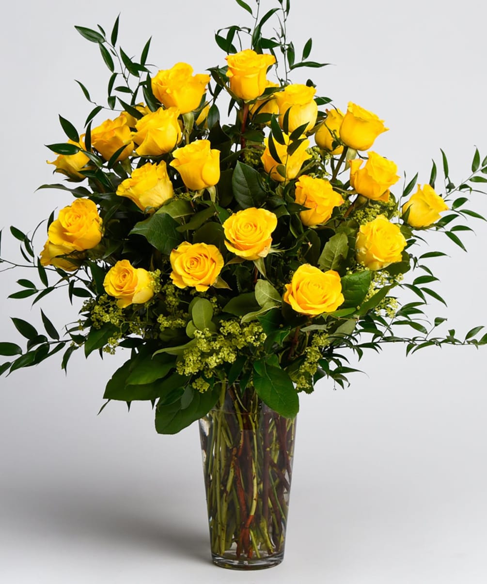 Our long stemmed premium yellow roses in beautiful cut vase with premium