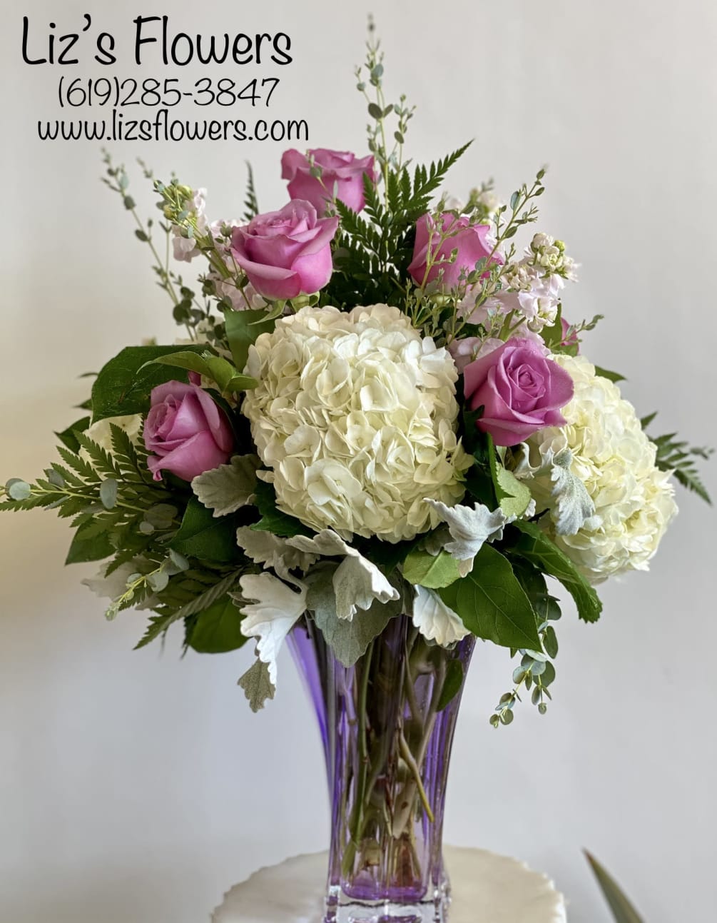 Lavender Roses, Lavender/White Stock and White Hydrangea are very elegant In this