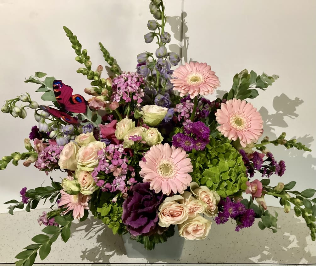 Shades pink, purple and blue for a mixed summer bouquet. Snapdragons, gerberas