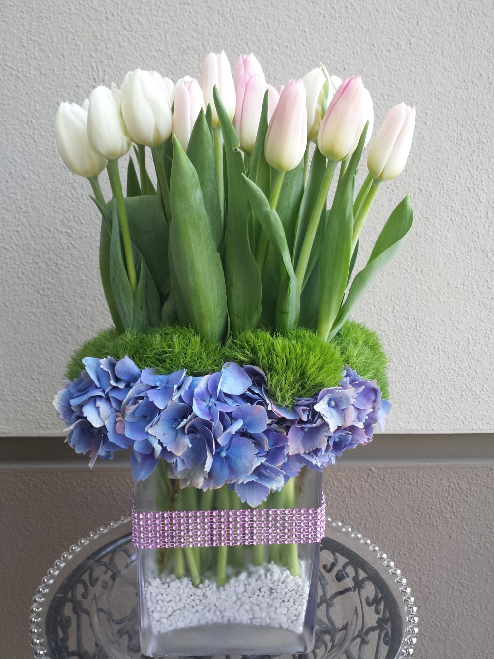 Dutch tulips designed in a fashionable arrangement.  Great for every day