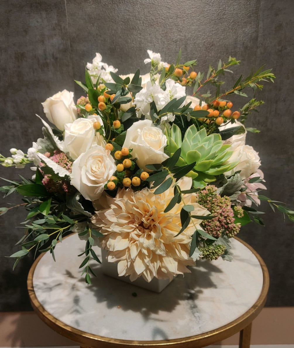 A soft colored variety of beautiful flowers brought together in a white
