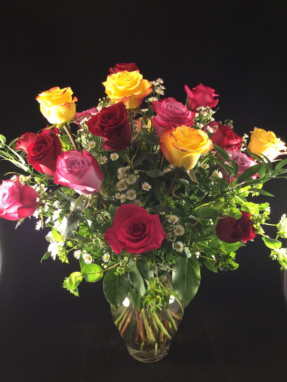 24 long stemmed roses in a variety of colors! (the Deluxe option