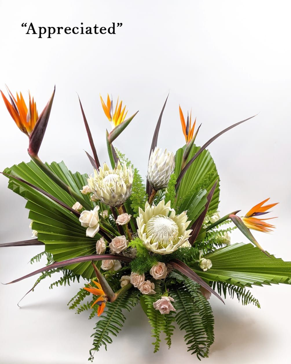 This arrangement must be purchased by phone or using our Custom Arrangements