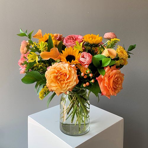 Vibrant textured blooms pay homage to the rosy blush and warm yellow