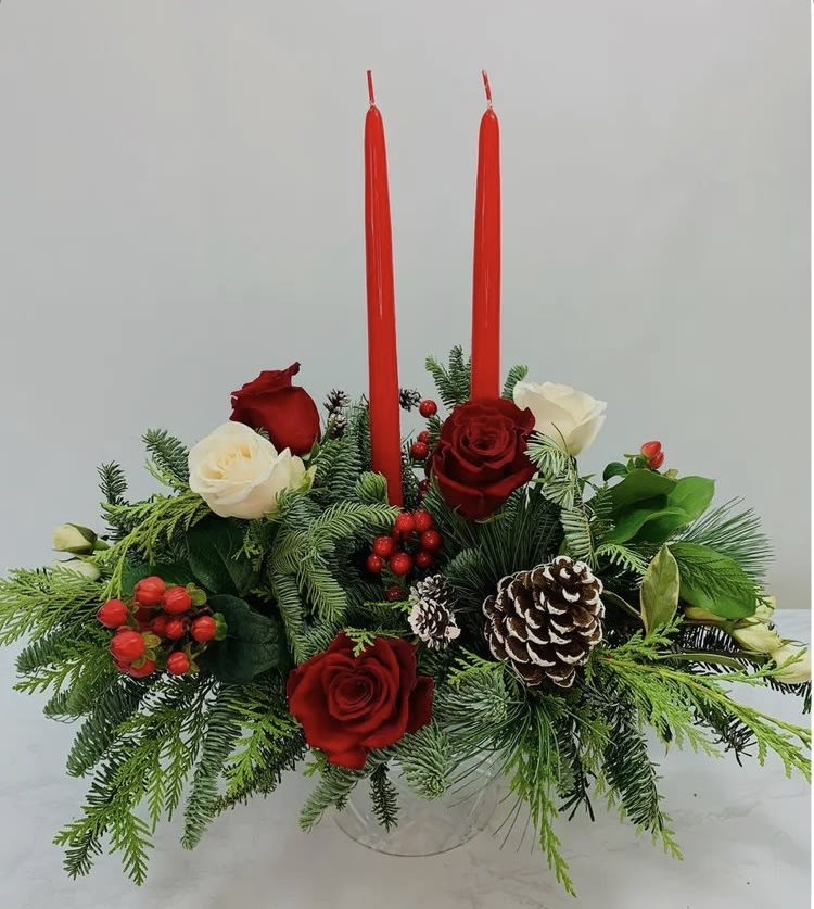 Our traditional table arrangement creates the perfect centerpiece for your Christmas celebration.