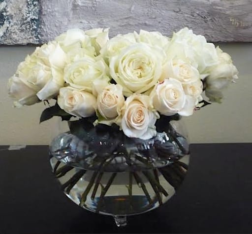 A Pavee of different shades of monochromatic pale roses.