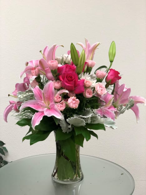 &quot;Go ahead, make her blush! This luxurious bouquet of roses, lilies and