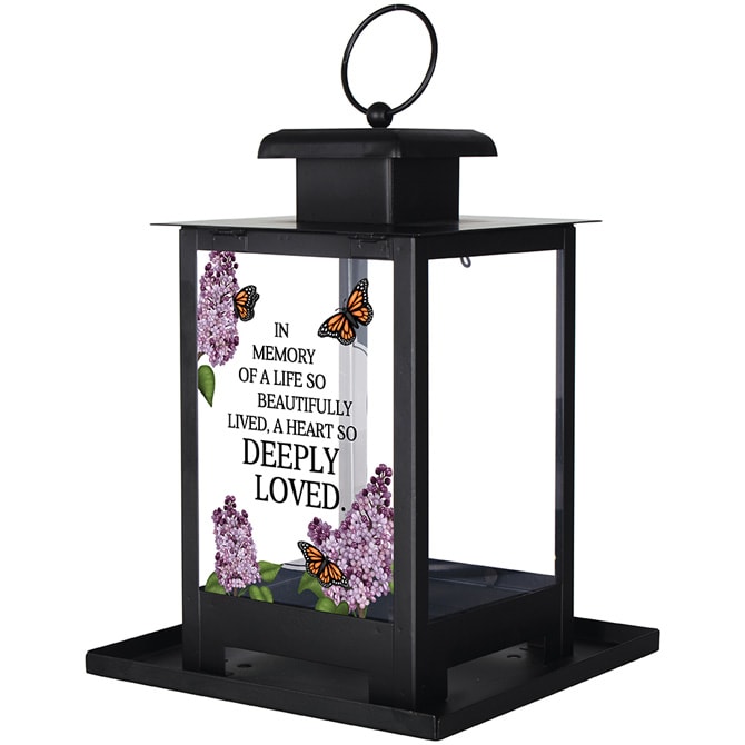 This charming bird feeder features Monarch butterflies and Lilac flowers and reads: