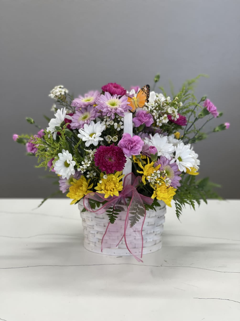Filled with happy spring flowers, this is the perfect gift for someone