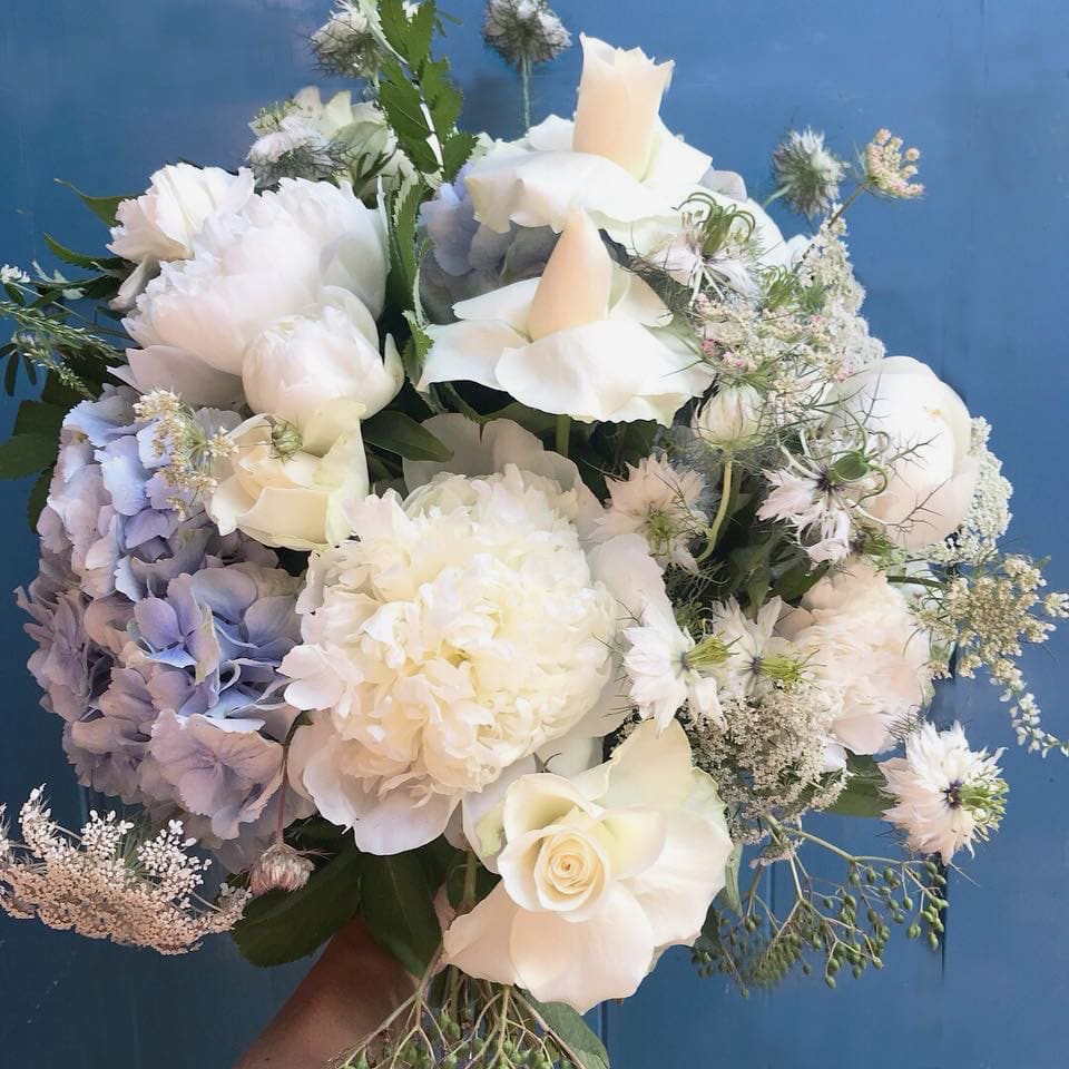 Go classic with this hand tied bouquet in blues and whites. Perfect