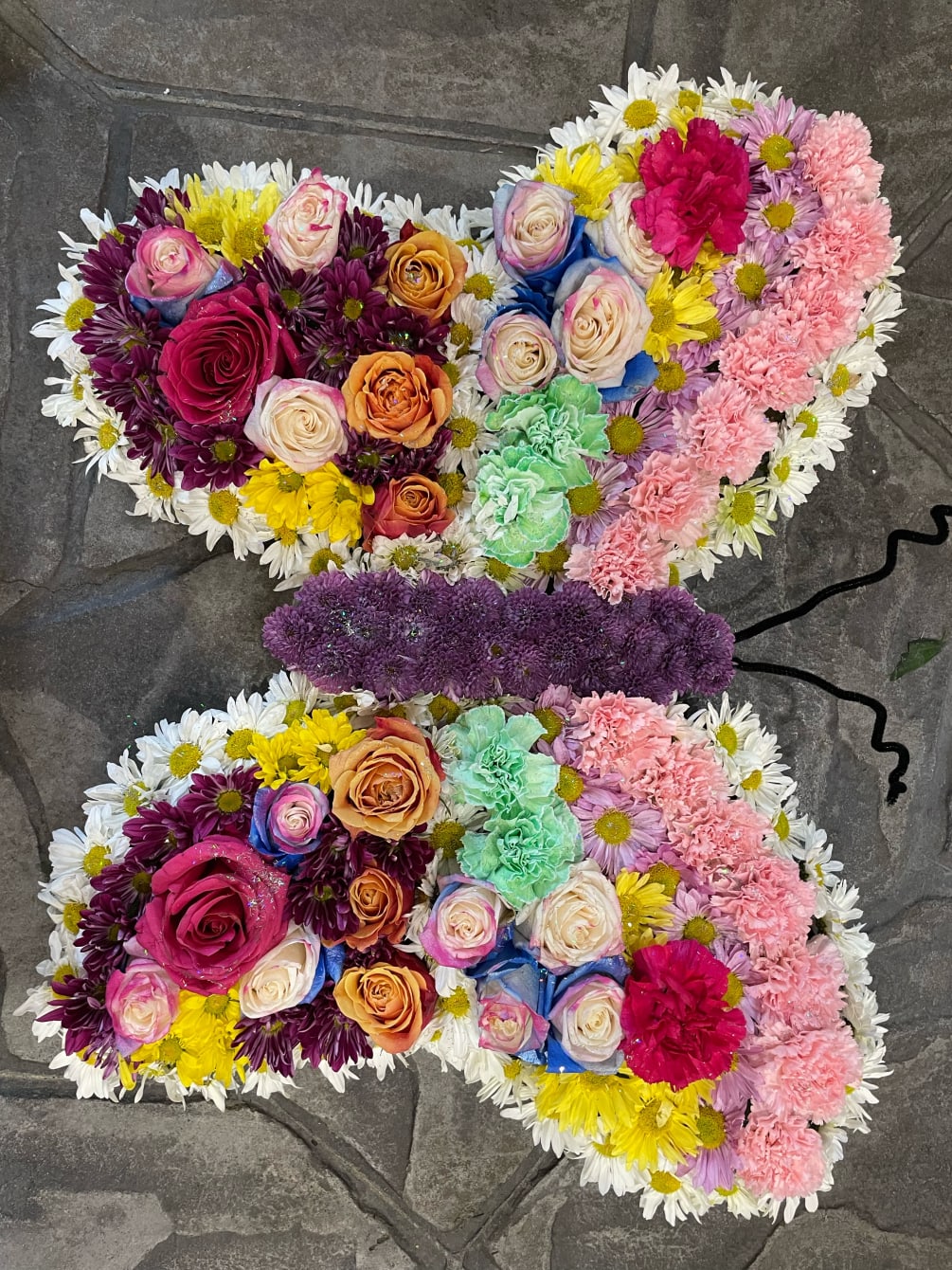 Butterfly Funeral Arrangement by The Flower Shoppe