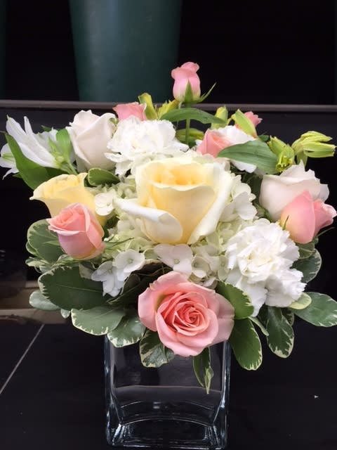 A gorgeous elegant mix of pastel colored flowers, including everyone&#039;s favorite...roses! This