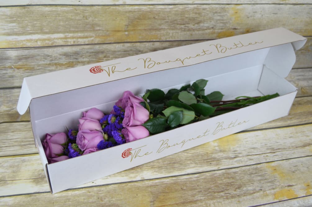 The ecstasy and charm of lavender roses fill the air with elation.