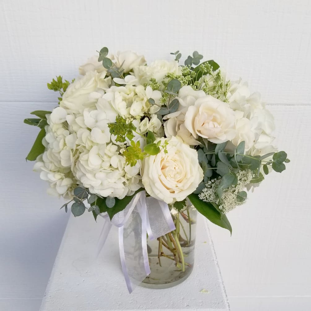 All white flowers in a compact but textured design.  
Upgrades to